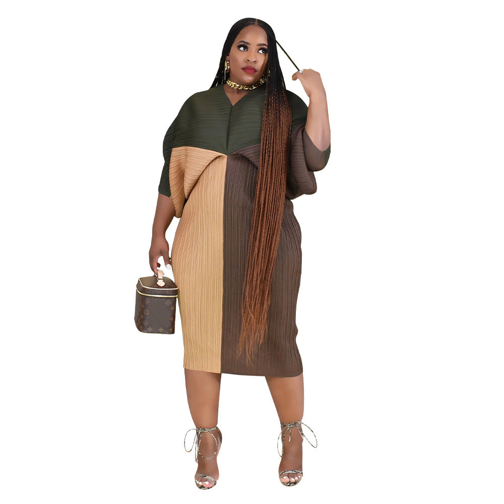 V-neck dress with pleated batwing sleeves in contrasting colors