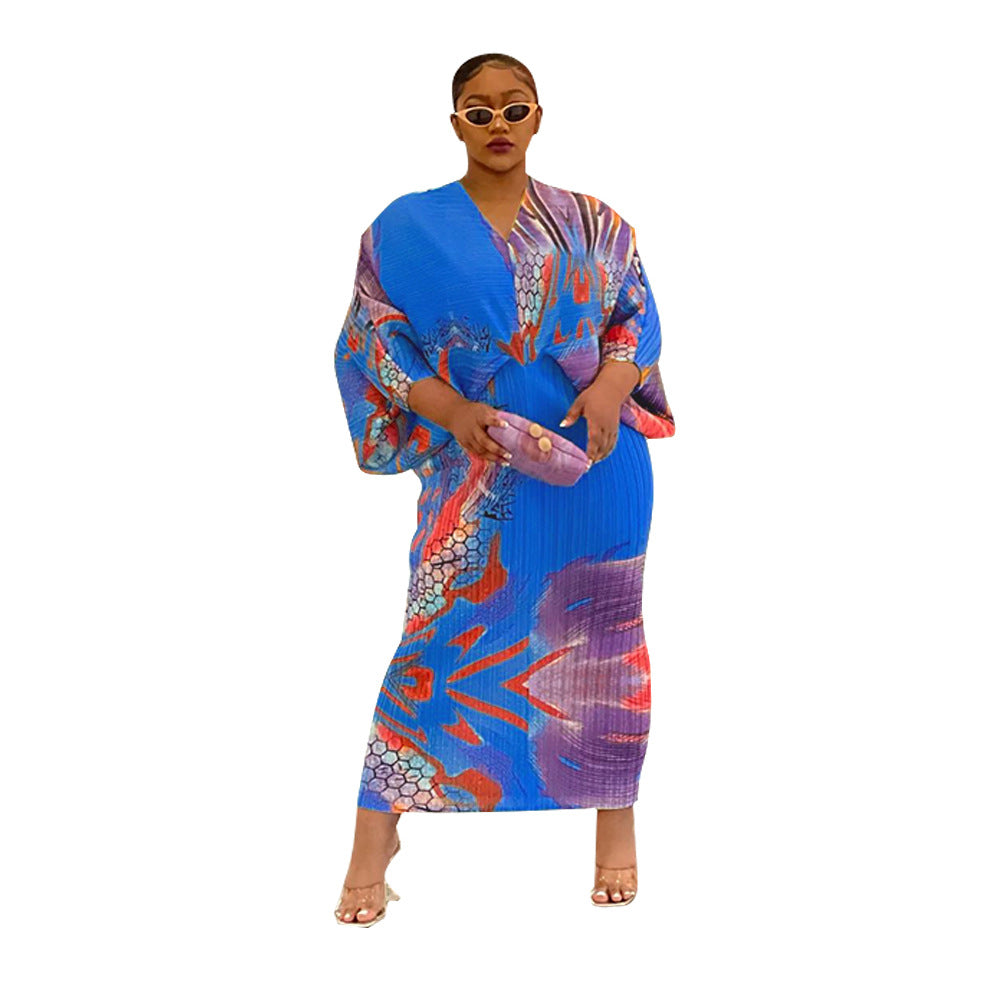 V-neck dress with pleated batwing sleeves in contrasting colors