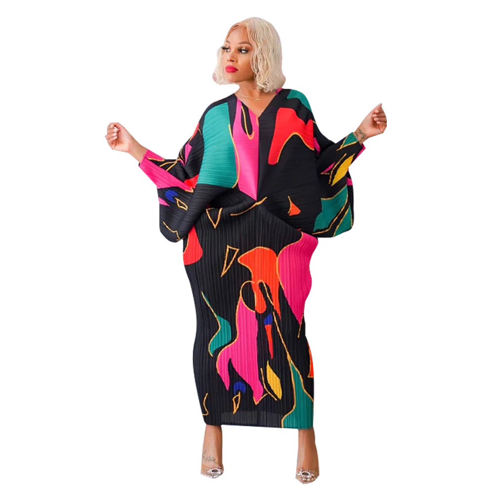 V-neck dress with pleated batwing sleeves in contrasting colors