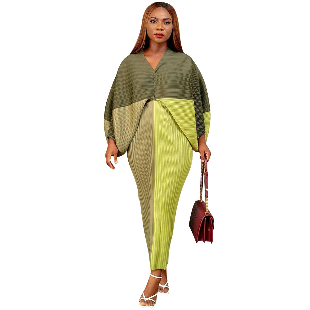V-neck dress with pleated batwing sleeves in contrasting colors