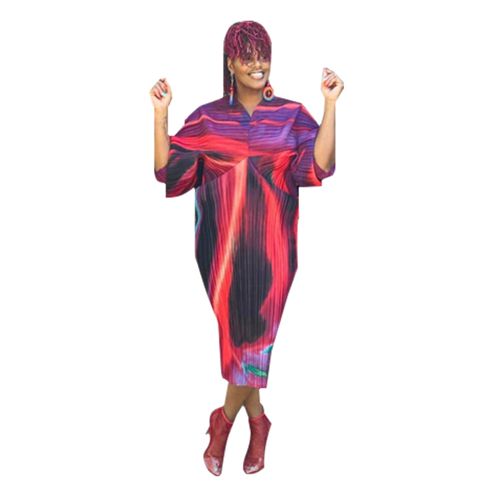 V-neck dress with pleated batwing sleeves in contrasting colors